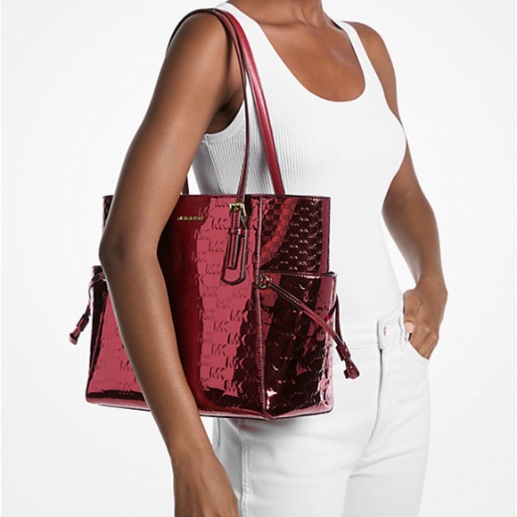 MICHAEL KORS Voyager Lg Metallic Logo Debossed EW Shoulder Tote Bag
Cherry 
NWT - Picture 14 of 16